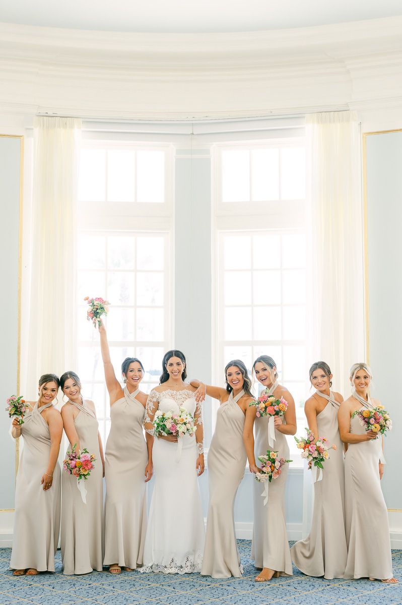 bridesmaids in champagne dresses in Galveston
