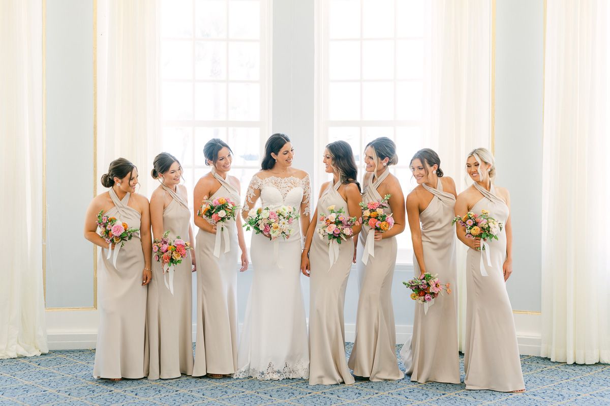 bridesmaids in champagne dresses in Galveston