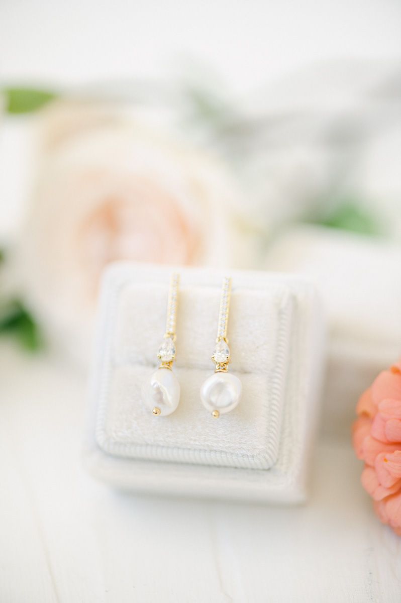 bride's earrings in white box