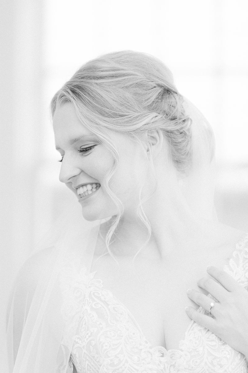 bride wearing long veil in Houston, Tx
