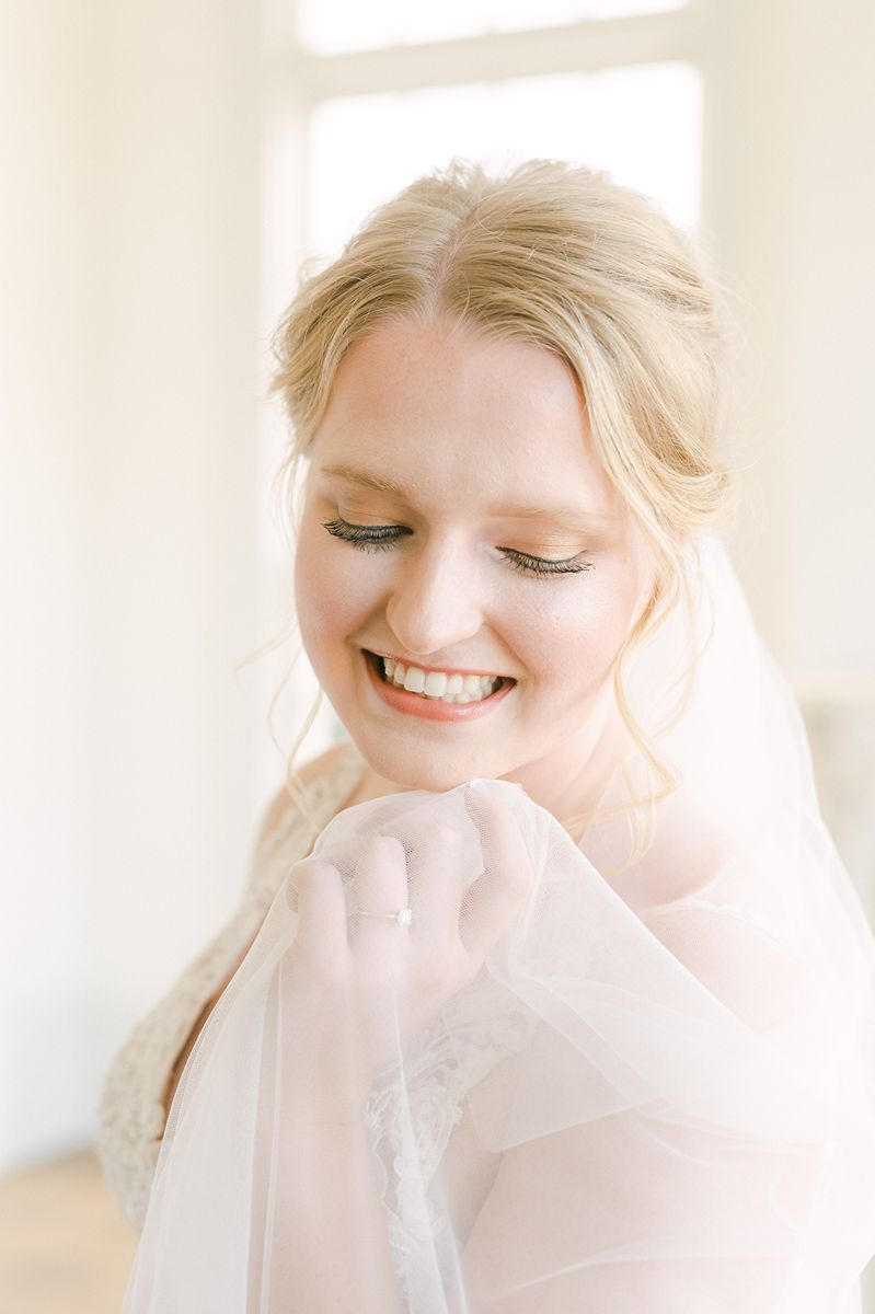 bride wearing long veil in Houston, Tx