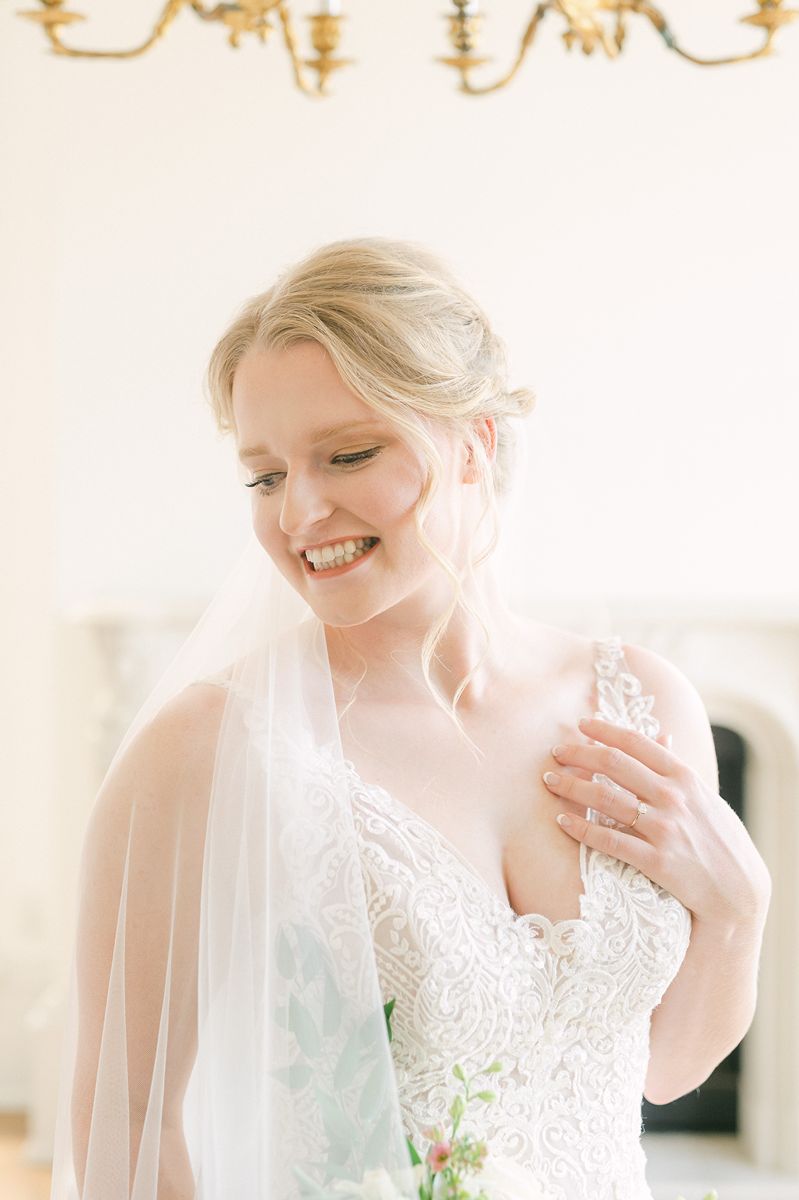 bride wearing long veil in Houston, Tx