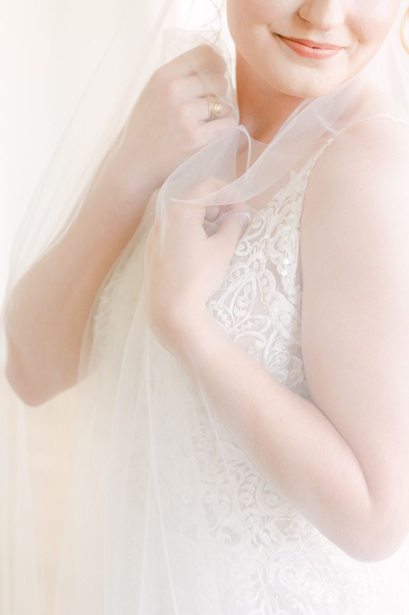 bride wearing long veil in Houston, Tx