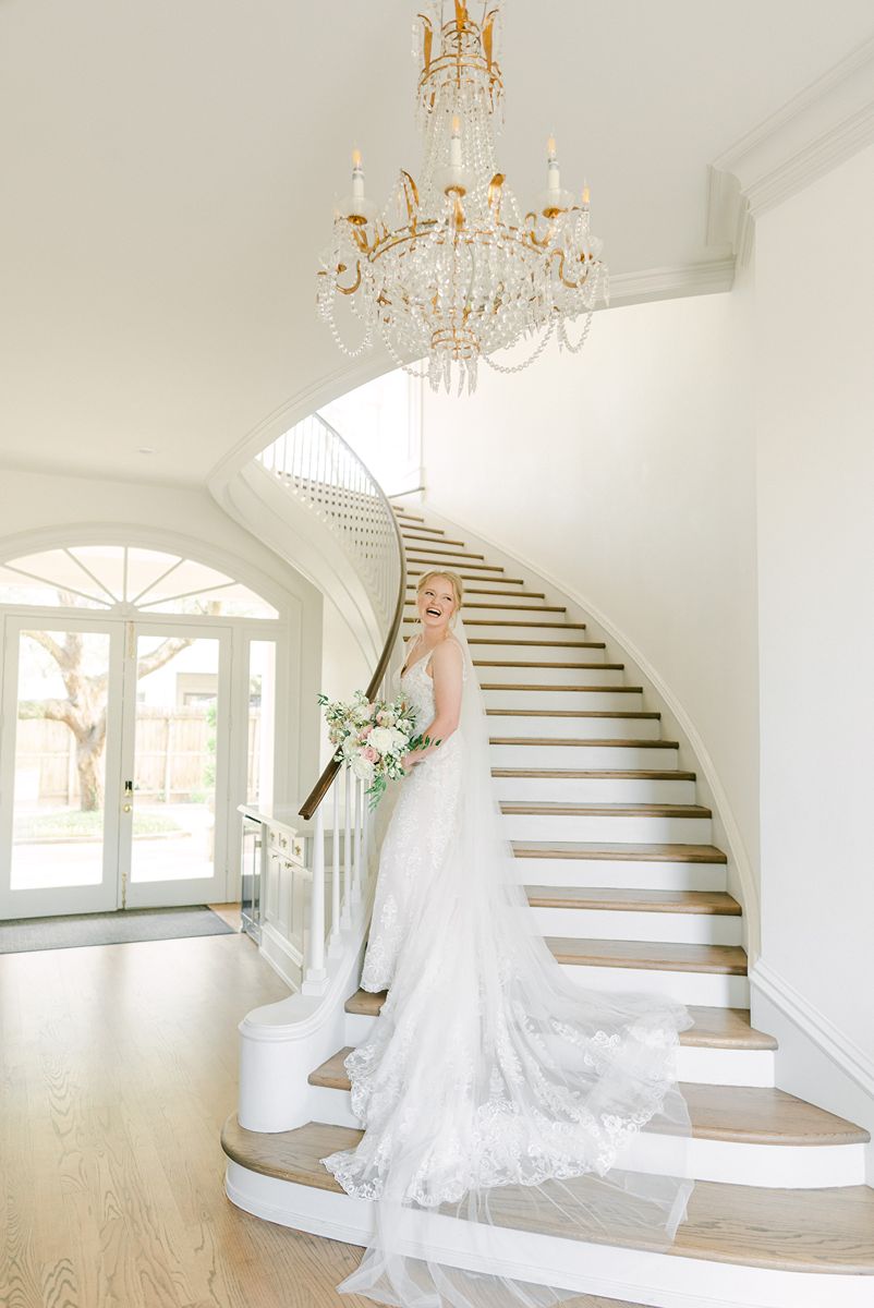 bride on the stairs at The Creative Chateau
