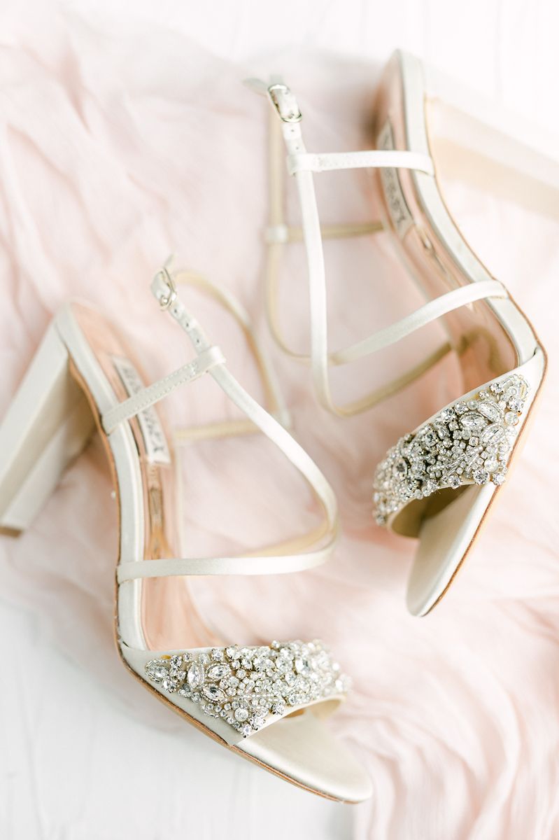 wedding shoes on pink fabric
