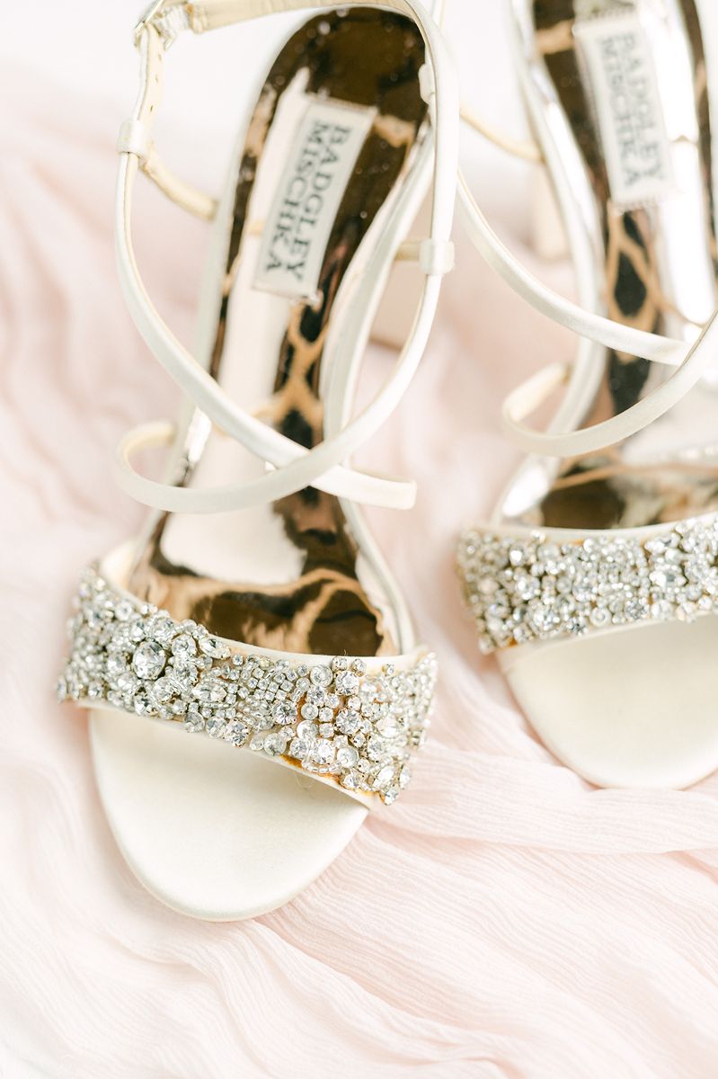 wedding shoes on pink fabric