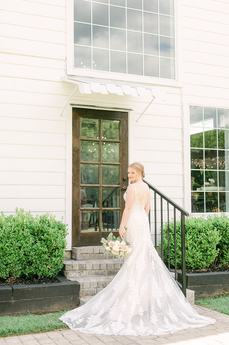 bride on the stairs behind Venue 311