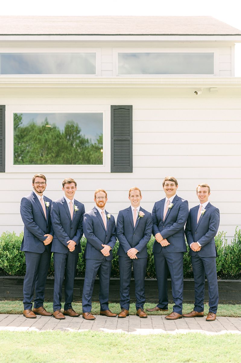 groomsmen outside Venue 311 Plantersville Tx
