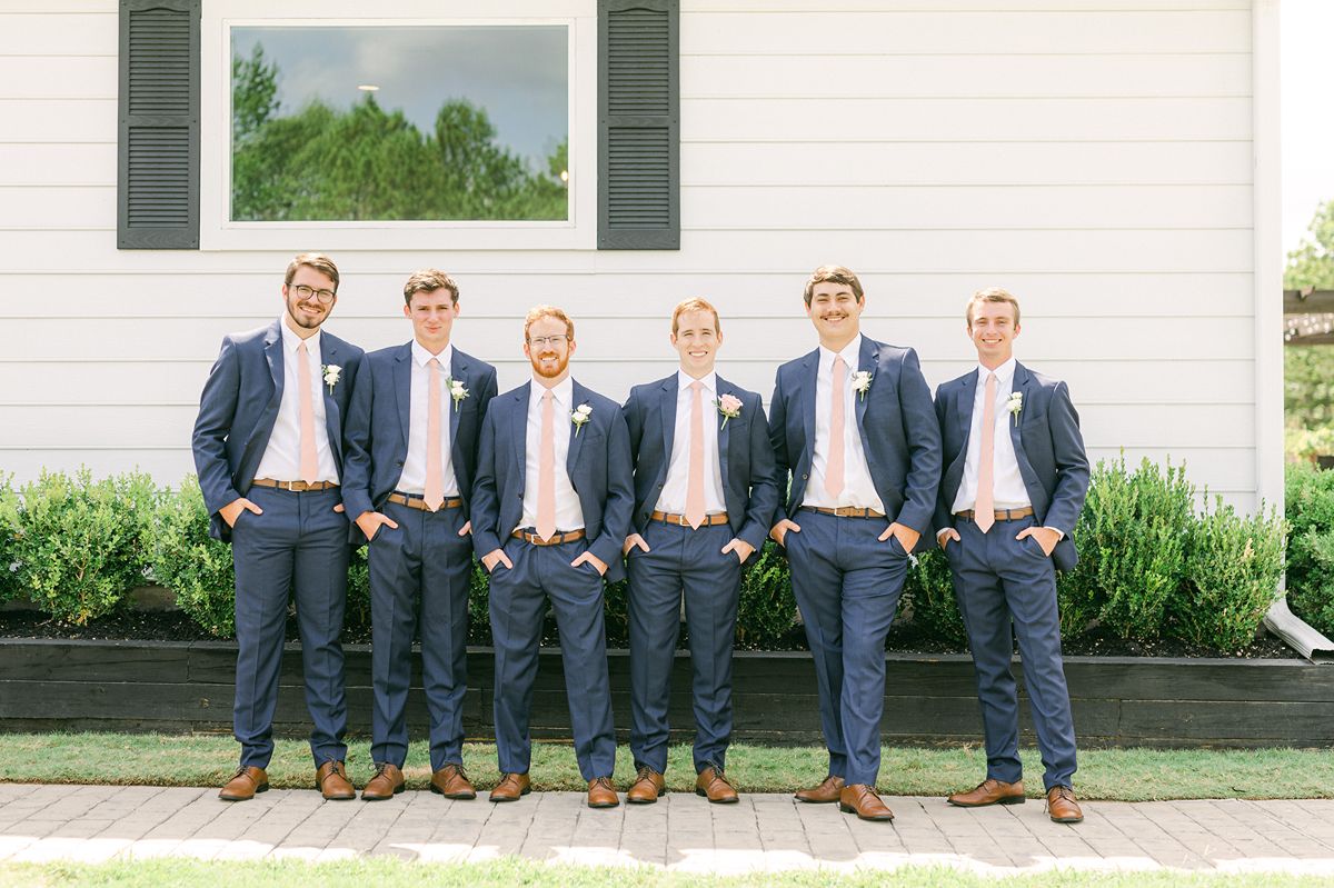 groomsmen outside Venue 311 Plantersville Tx