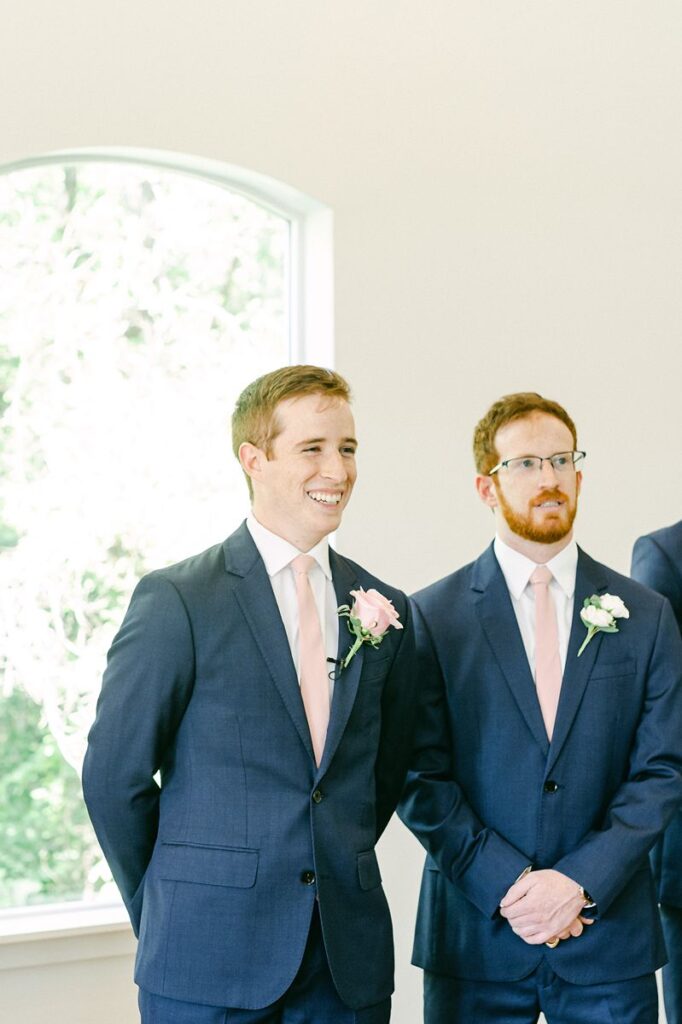 groom seeing the bride walk up the aisle