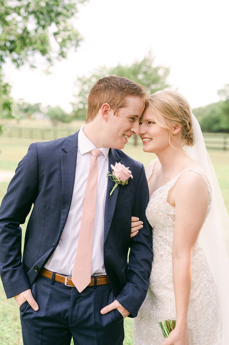 bride and groom at summer wedding at Venue 311 Plantersville Tx