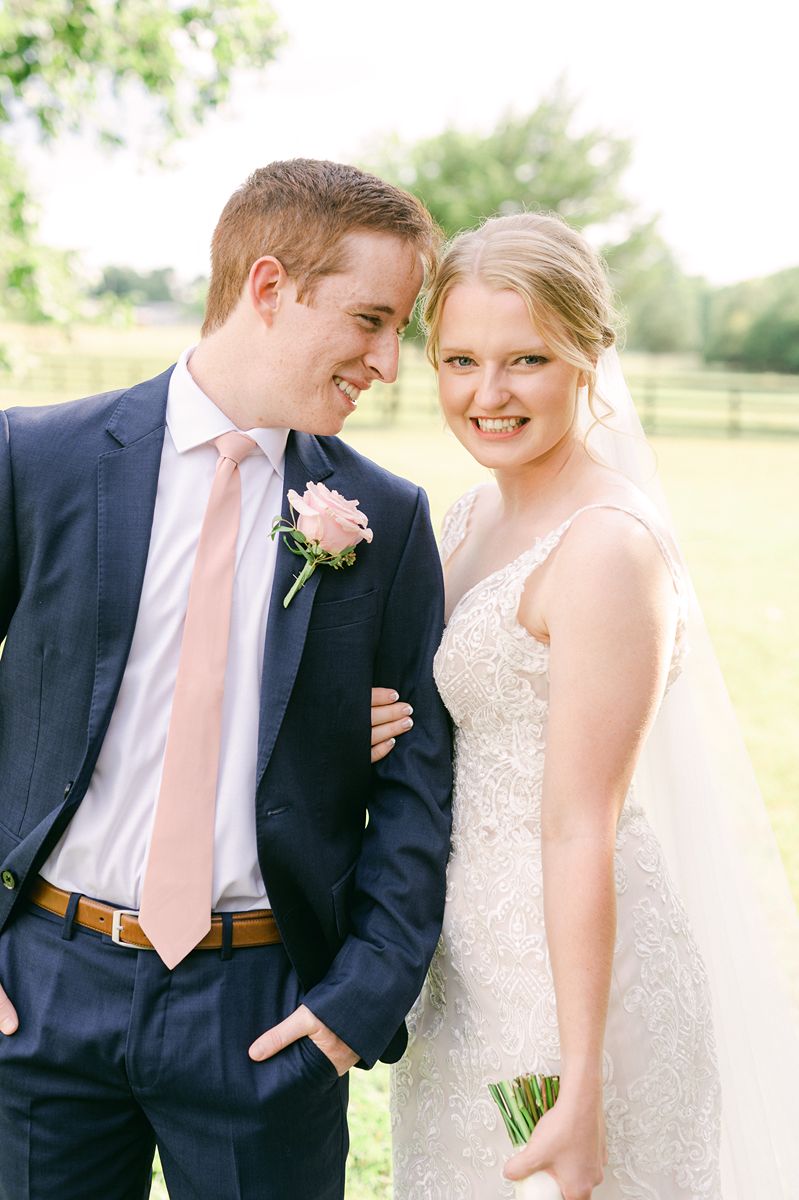 bride and groom at summer wedding at Venue 311 Plantersville Tx