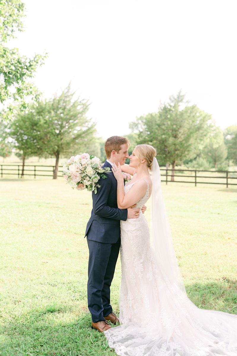 bride and groom at summer wedding at Venue 311 Plantersville Tx