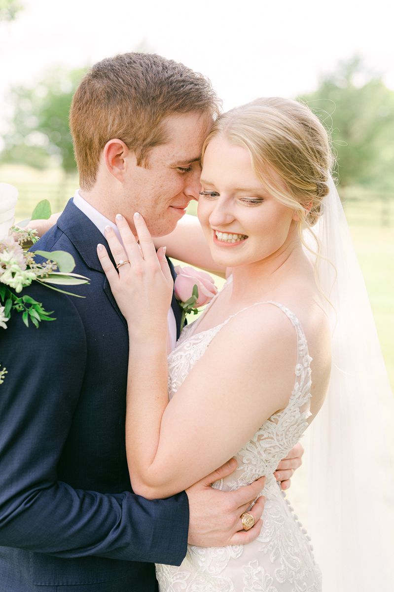 bride and groom at summer wedding at Venue 311 Plantersville Tx