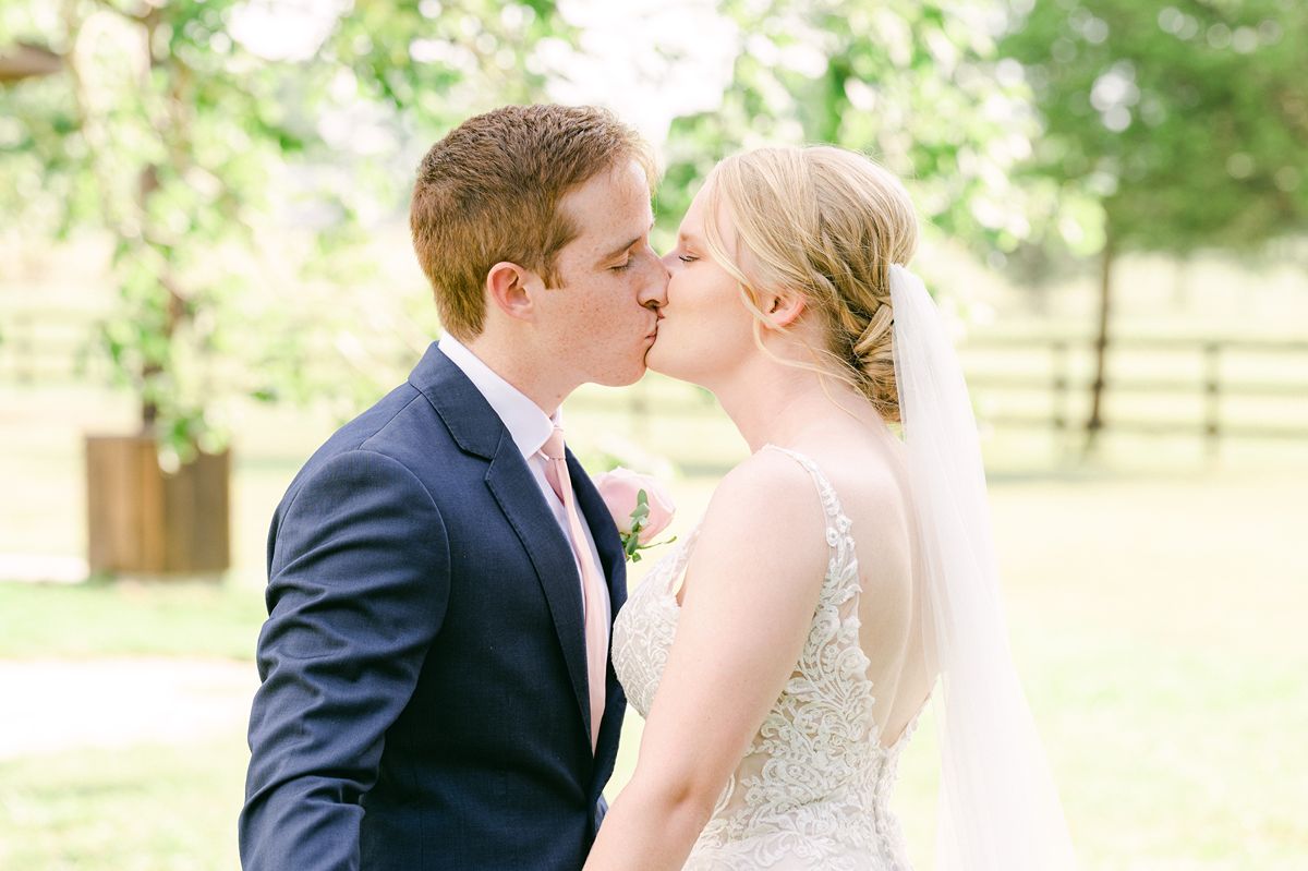 bride and groom at summer wedding at Venue 311 Plantersville Tx