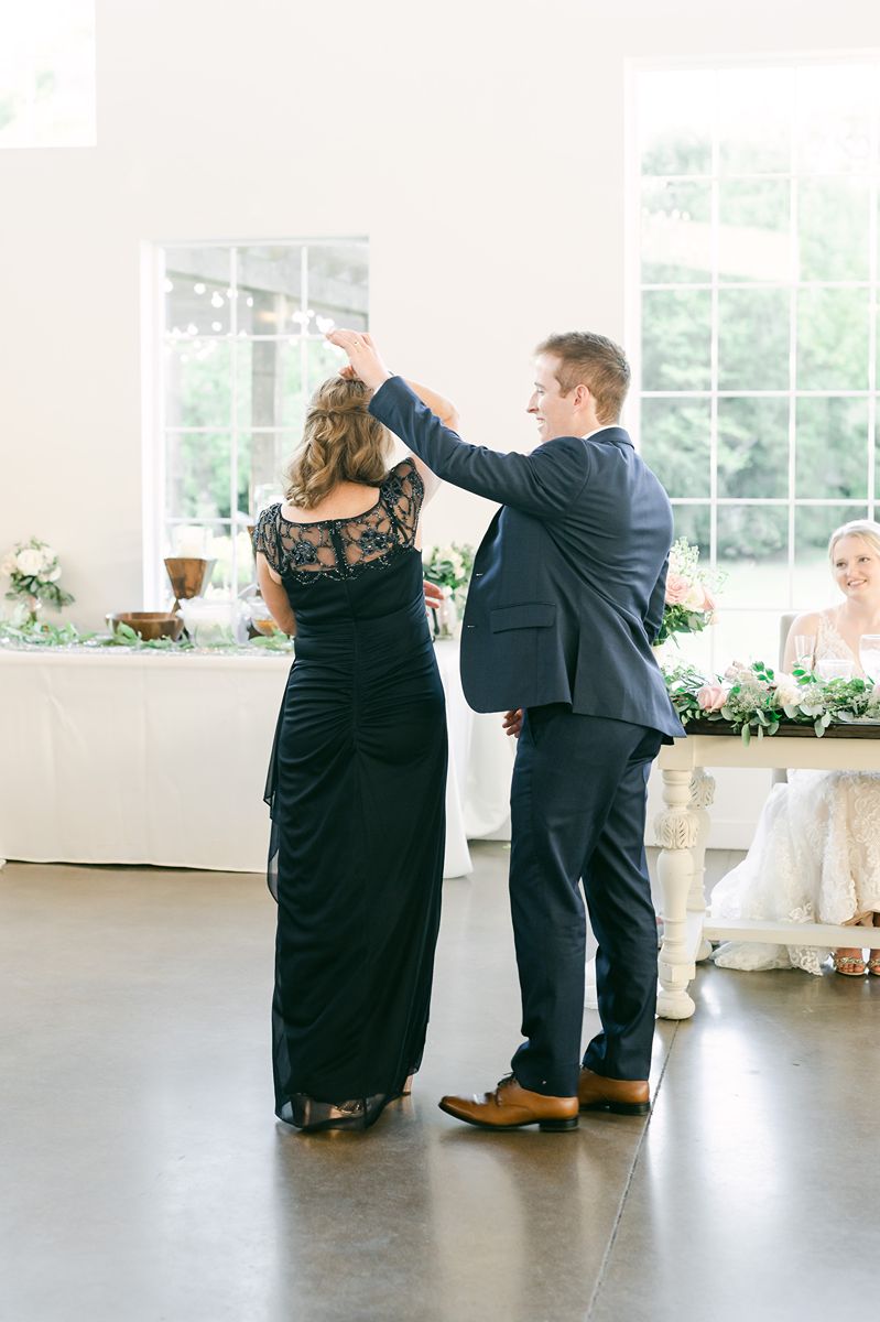 mother son dance at wedding reception in Texas