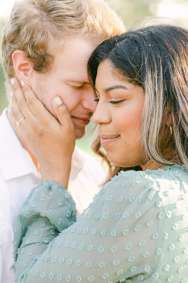 couple dancing during their engagement session in houston