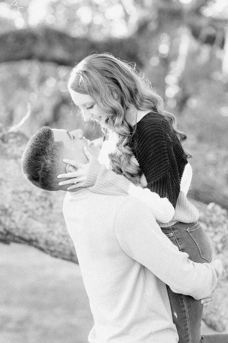 a couple spinning at their houston engagement session