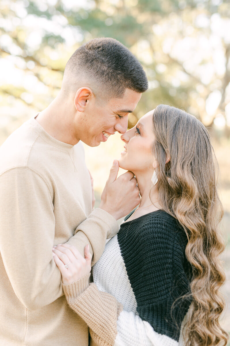 a couple posing for their engagement session