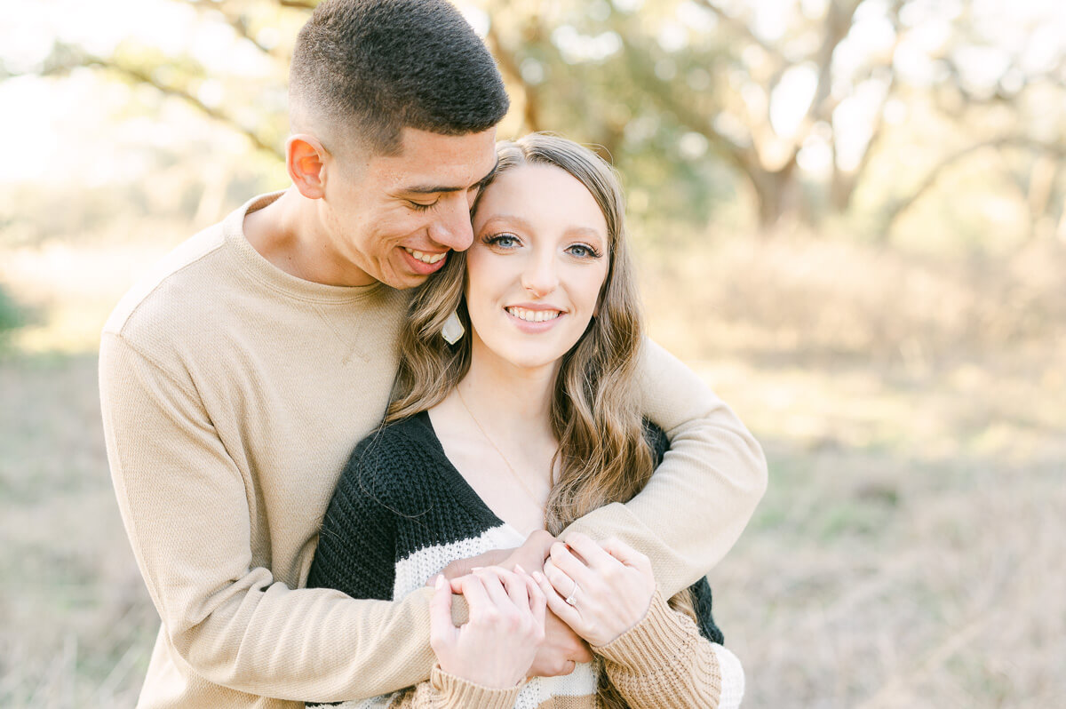 a couple posing for their engagement session