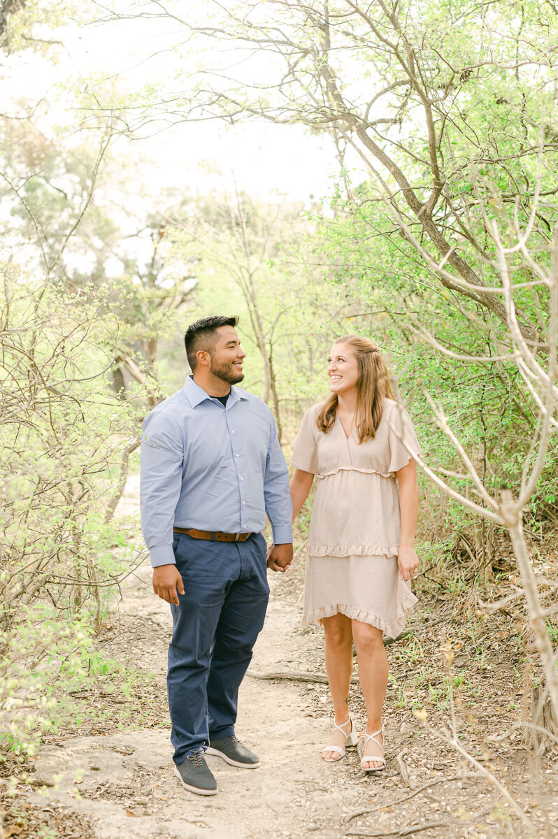 a couple at an engagement session at bull creek park