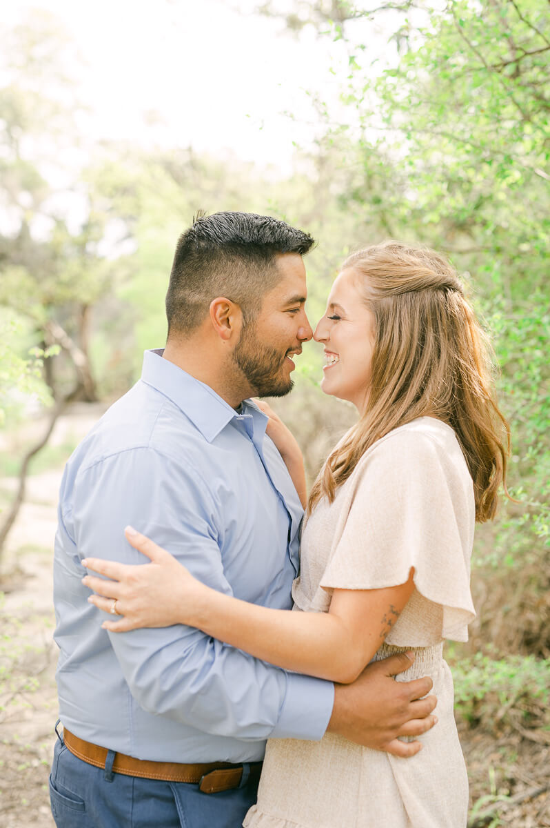 a couple at an engagement session at bull creek park