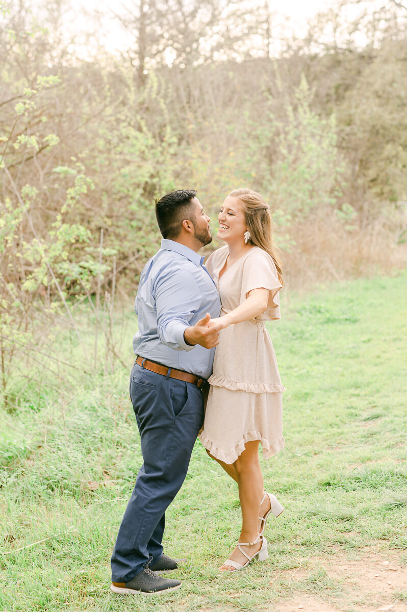 a couple at their engagement session by Houston wedding photographer Eric & Jenn Photography