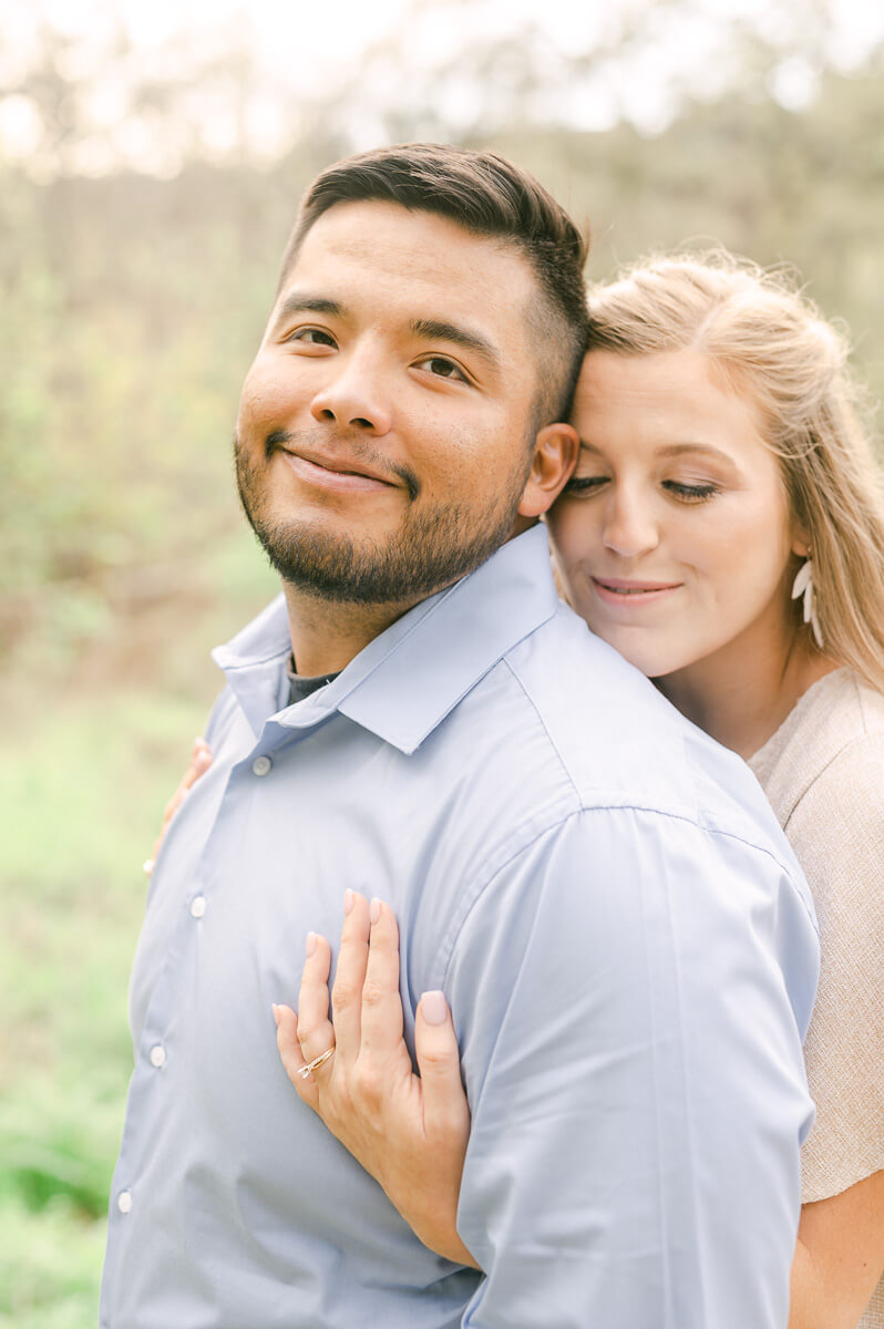 a couple at their engagement session by Houston wedding photographer Eric & Jenn Photography