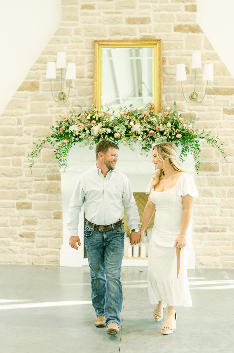 a couple walking at magnolia grove wedding venue