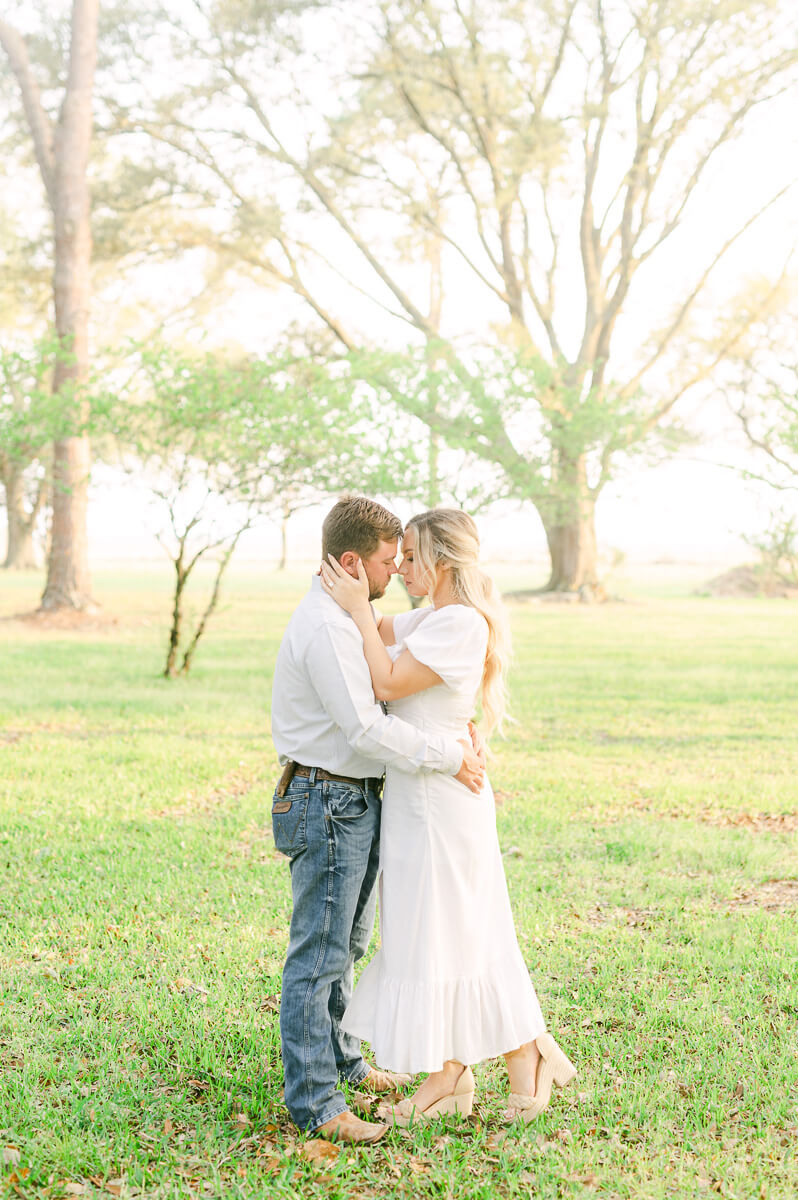 a couple cuddling at their engagement session