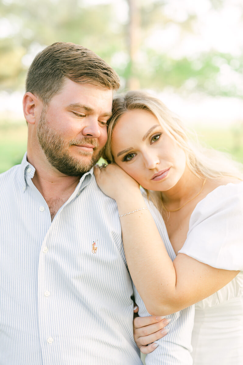 a couple wearing light colors