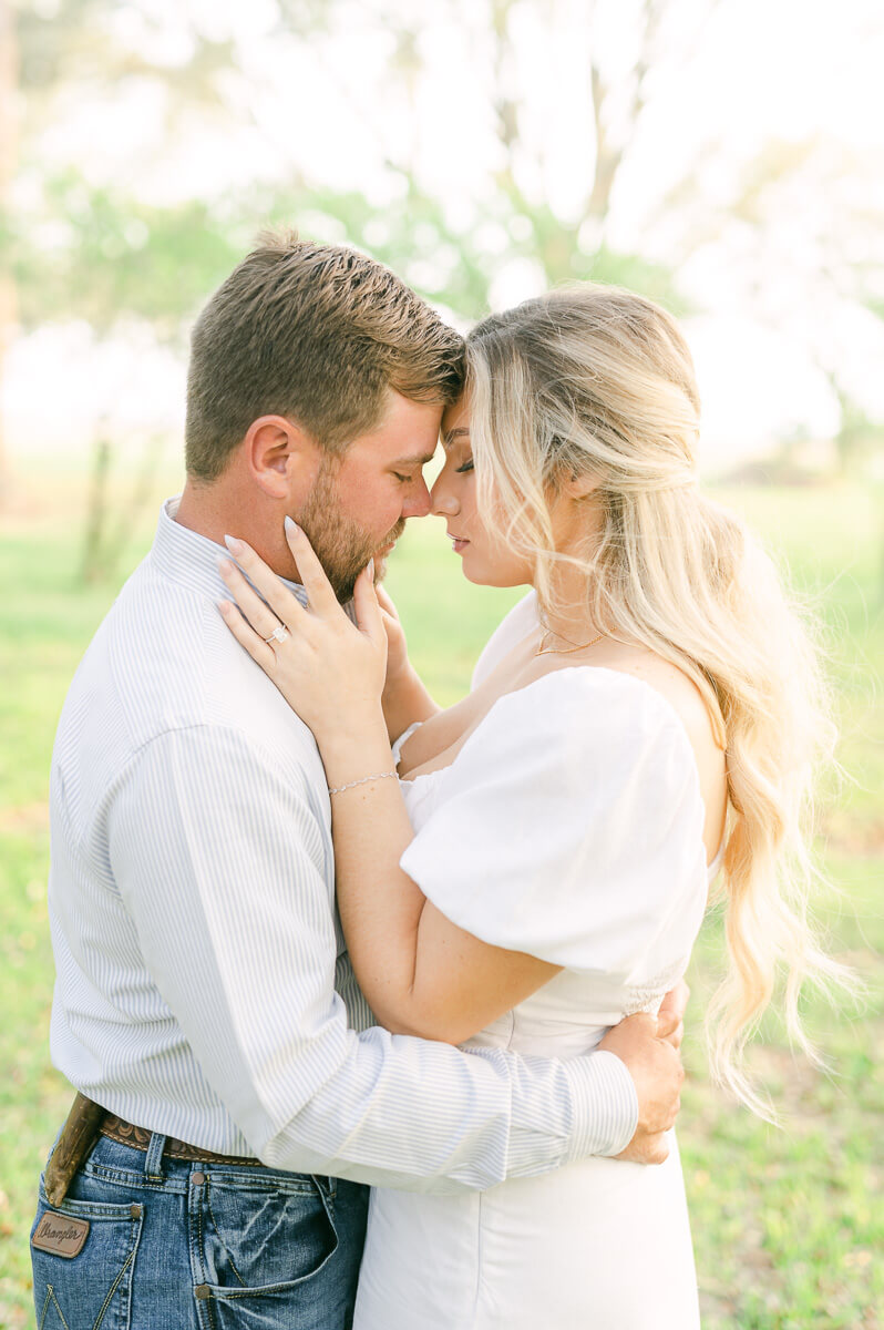 a couple wearing light colors