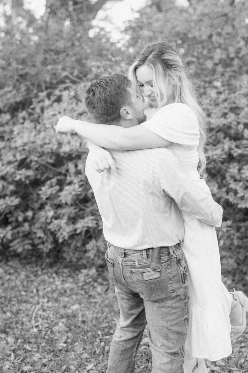 black and white photo of an engaged couple