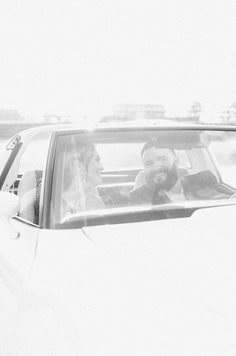 couple in vintage car in houston