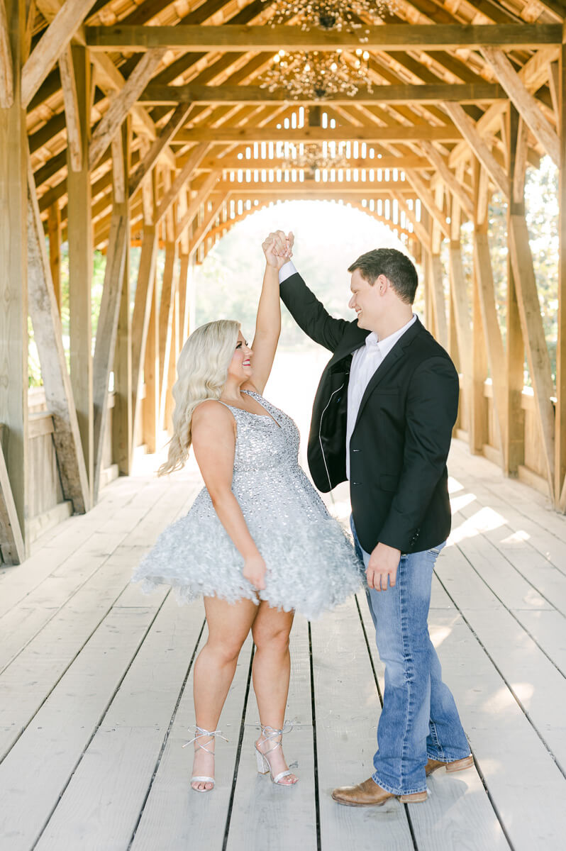 a couple dancing outside big sky barn