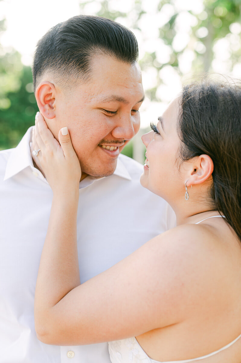 a couple posing for their engagement session 