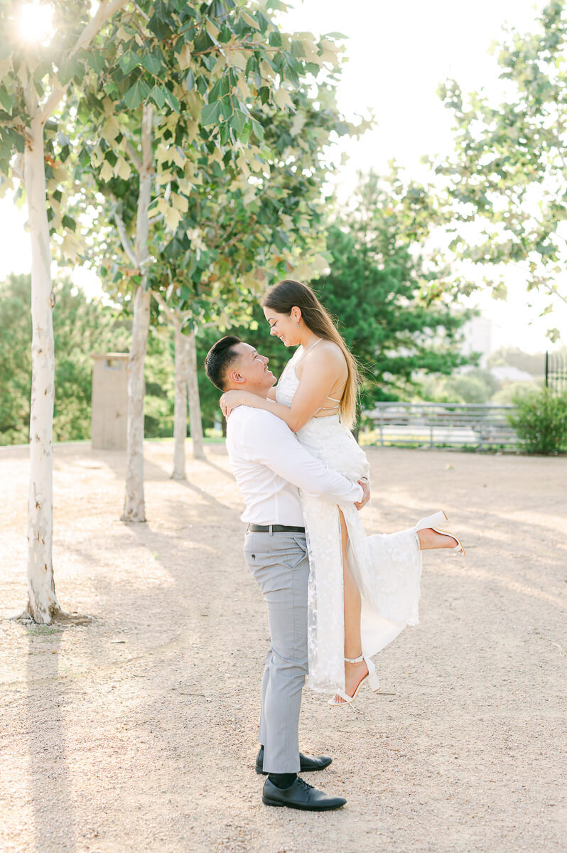 a couple spinning at their engagement session