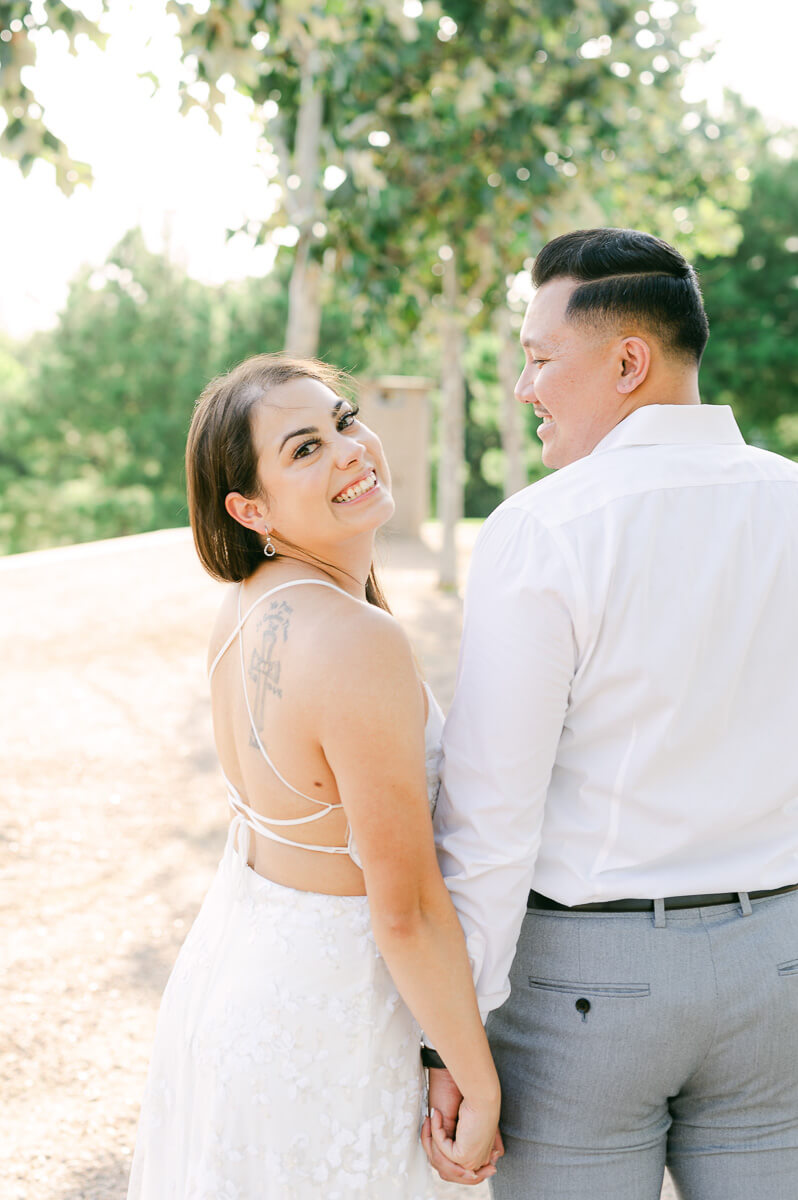 a couple spinning at their engagement session