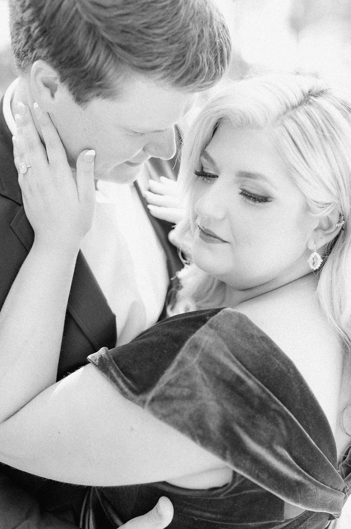 a black and white intimate engagement photo