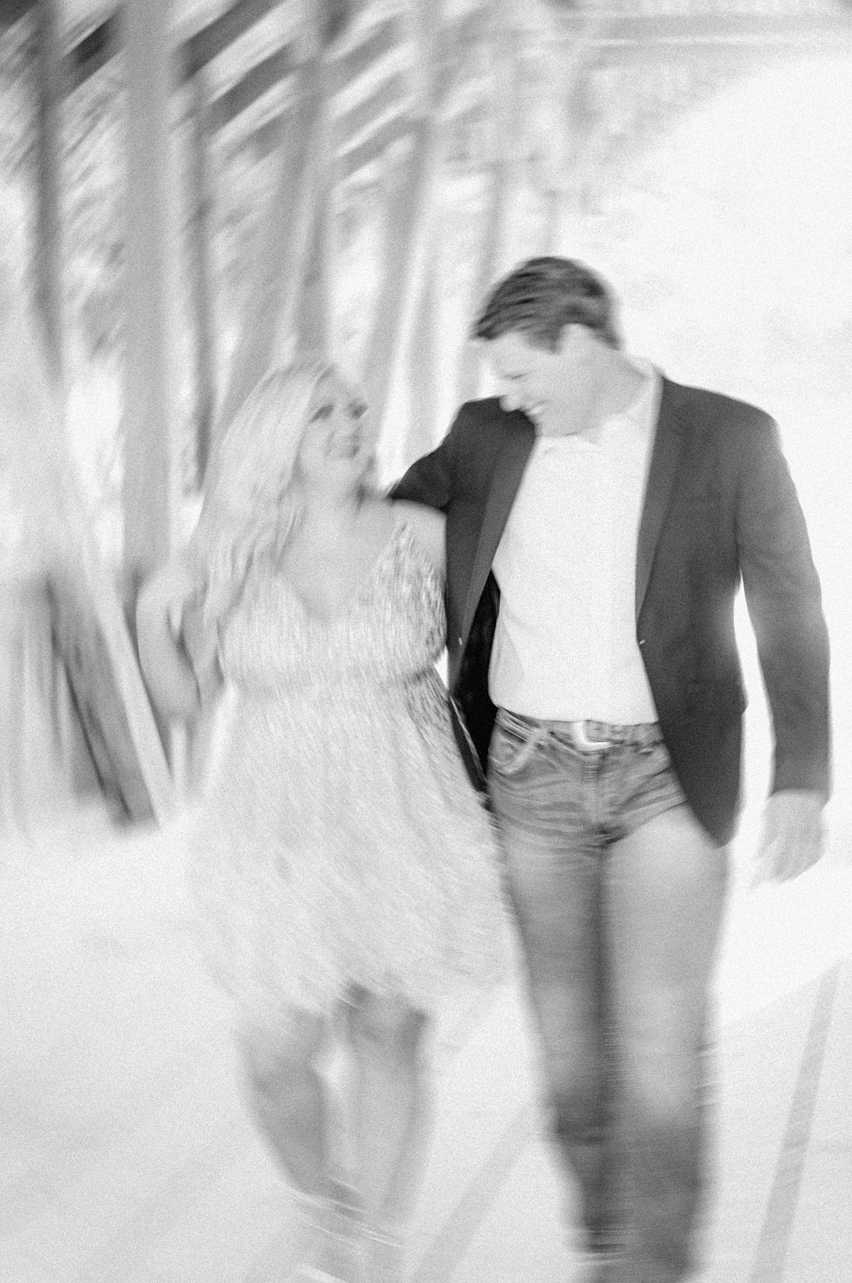 an artsy blurry photo of a couple at their engagement session 