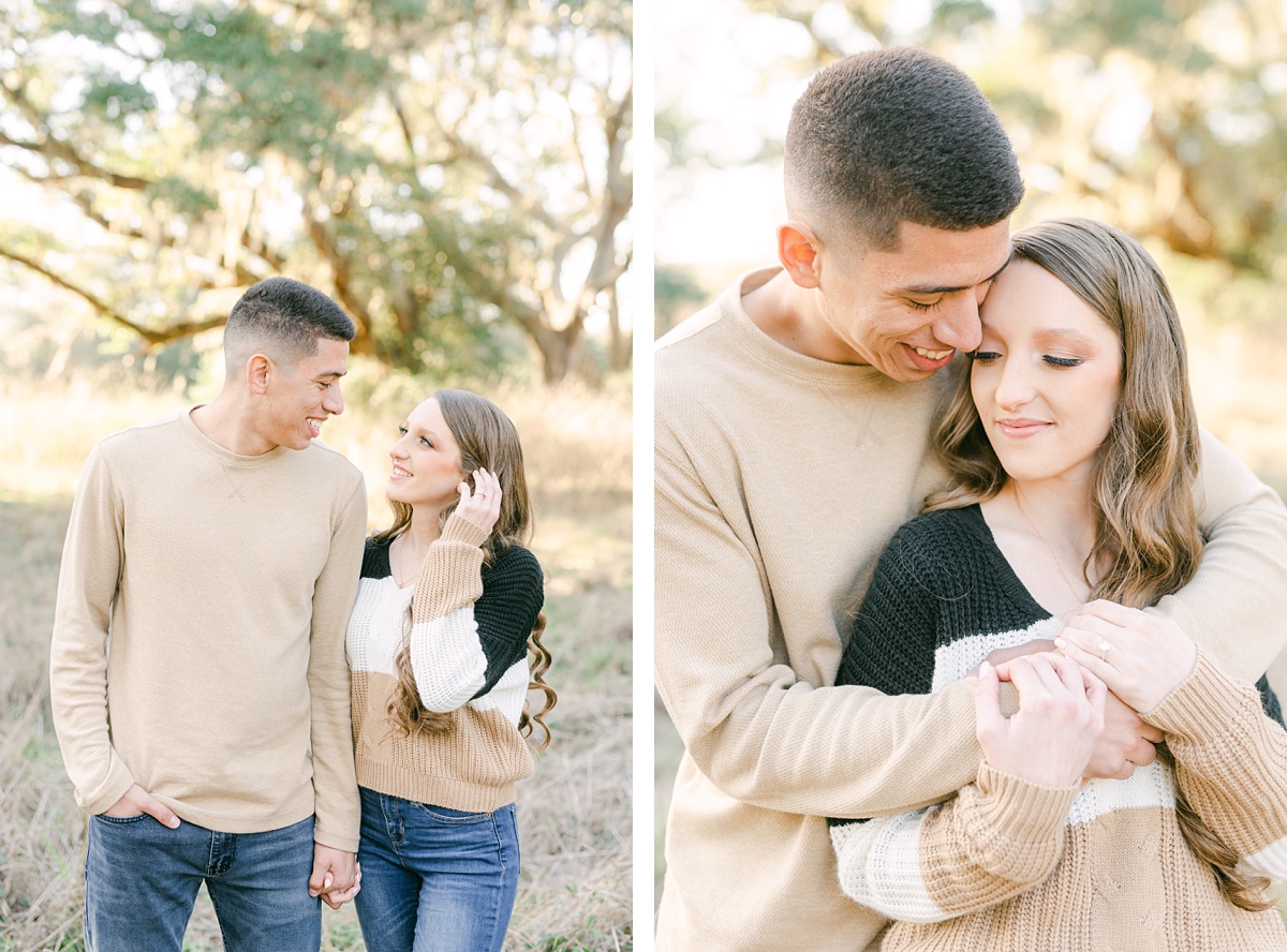 a couple cuddling at their houston engagement session