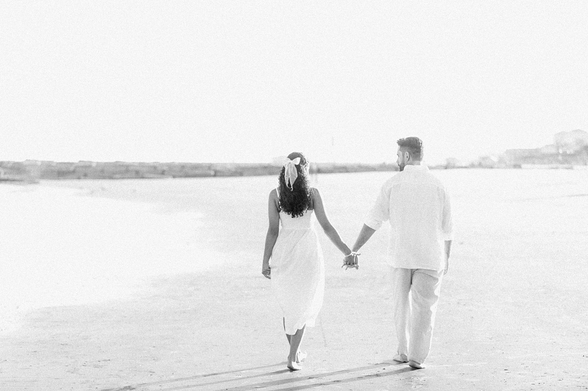 Black and white beach photo by Houston wedding photographer Eric & Jenn Photography