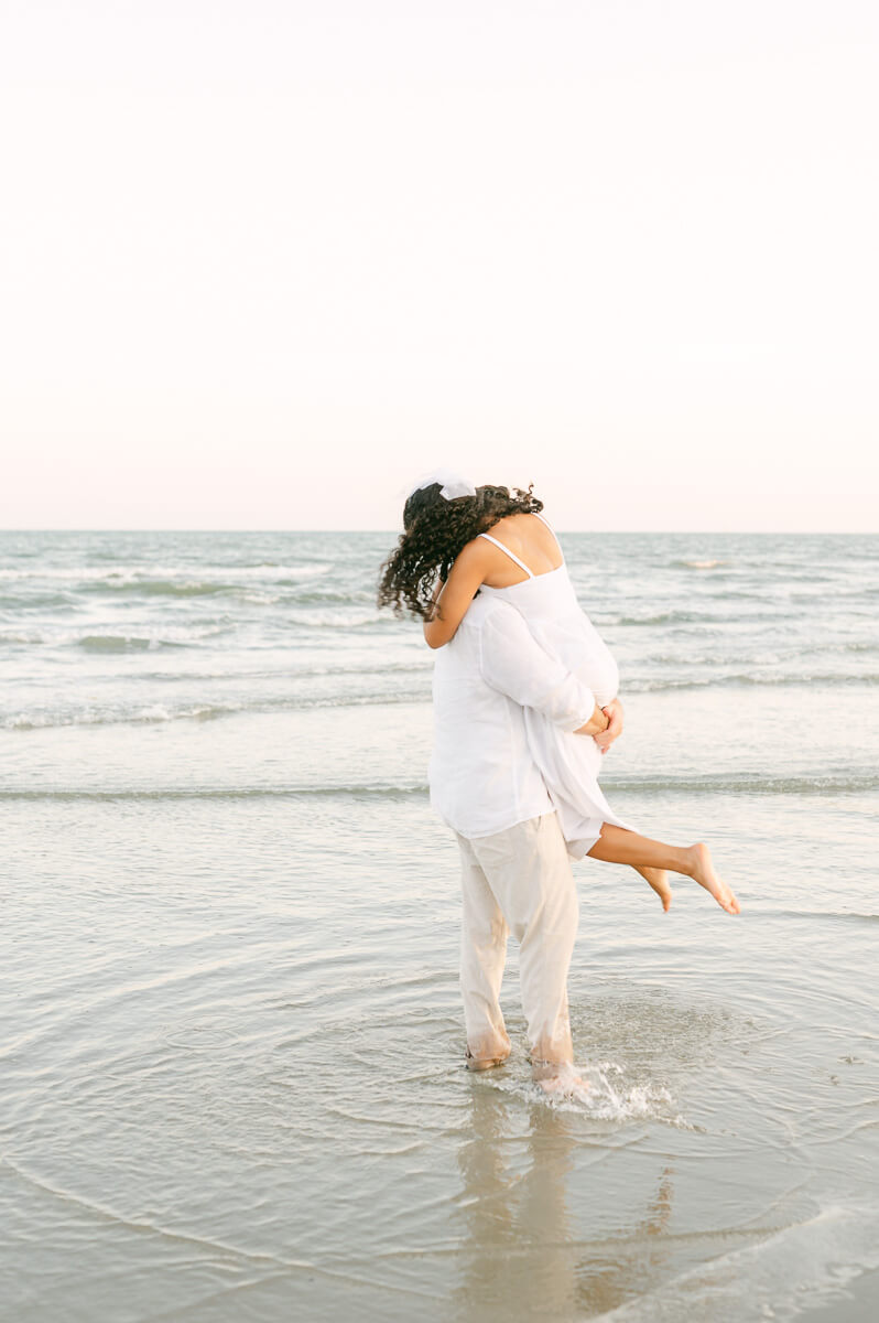 Couple on the beach during their Galveston engagement session