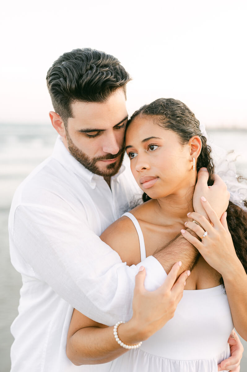 Couple on the beach during their Galveston engagement session