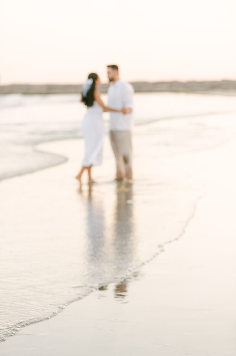 Couple on the beach during their Galveston engagement session