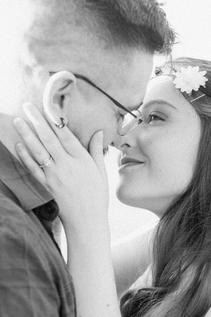 a black and white photo of an engagement ring