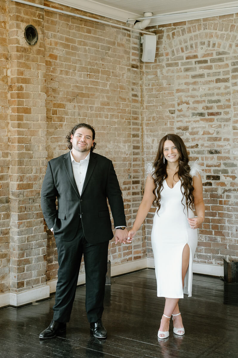 a couple posing for engagement photography at station 3 wedding venue