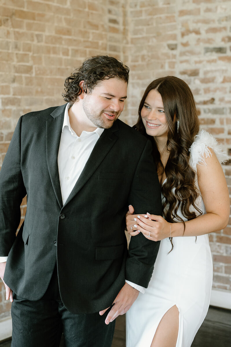 a couple posing for engagement photography at station 3 wedding venue