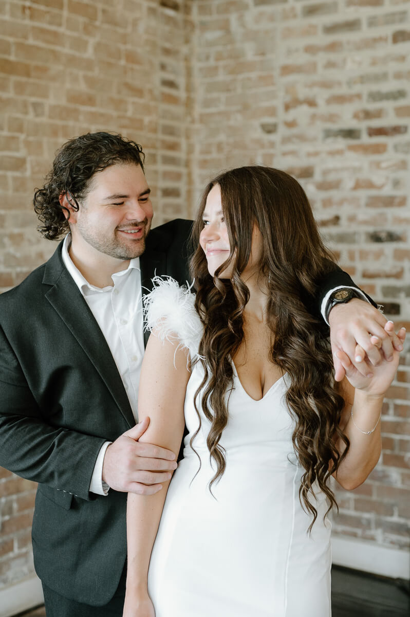 a couple posing for engagement photography at station 3 wedding venue