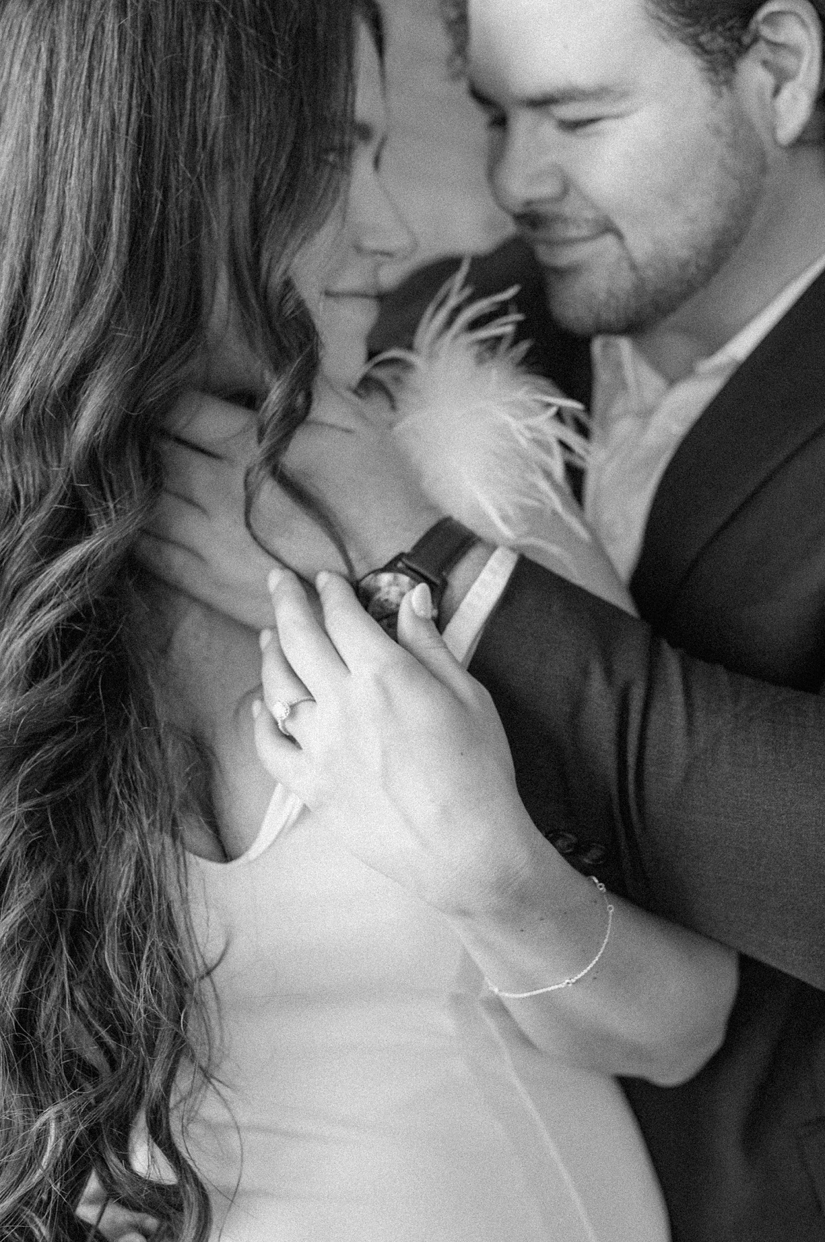 a black and white intimate photo of a couple at their engagement session